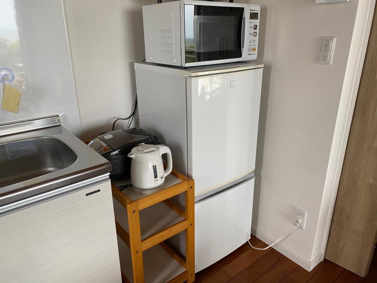 Appartamento Ocean Front Sumuide Nago Esterno foto