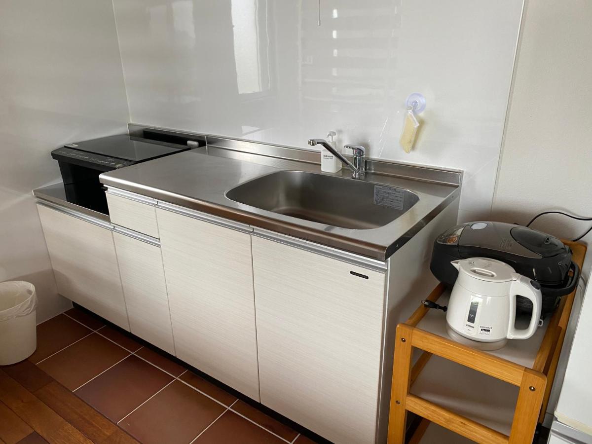 Appartamento Ocean Front Sumuide Nago Esterno foto