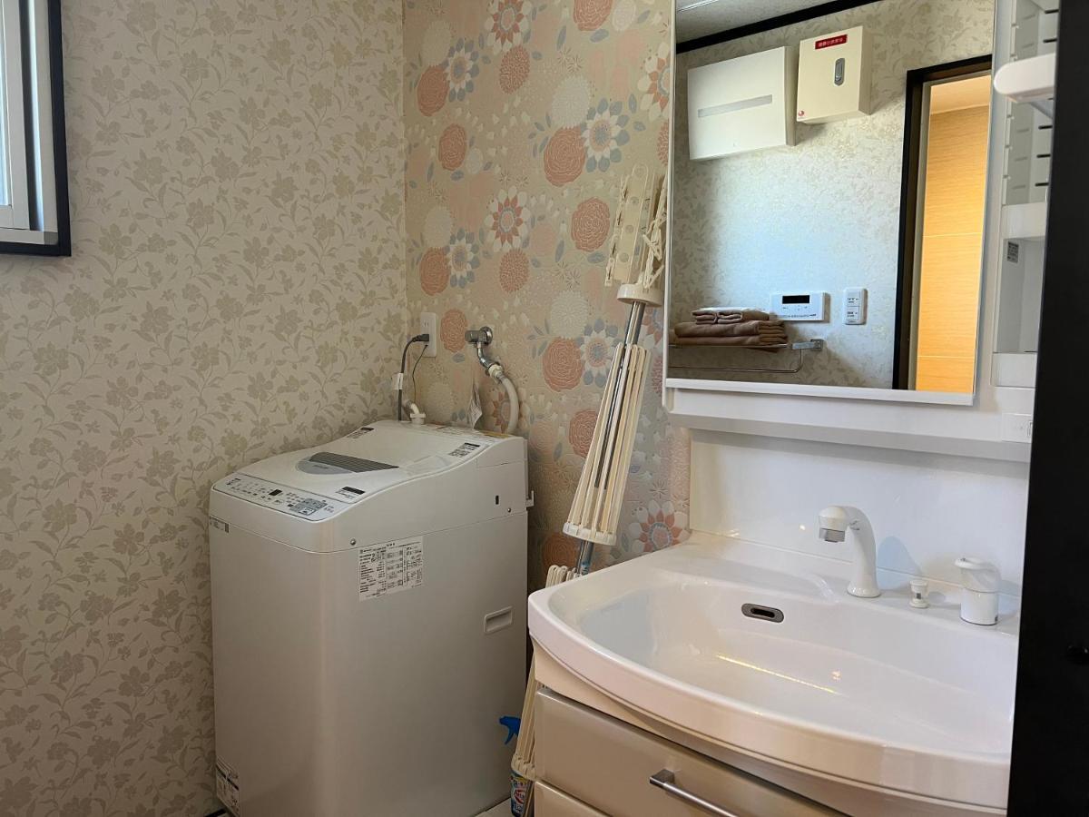 Appartamento Ocean Front Sumuide Nago Esterno foto