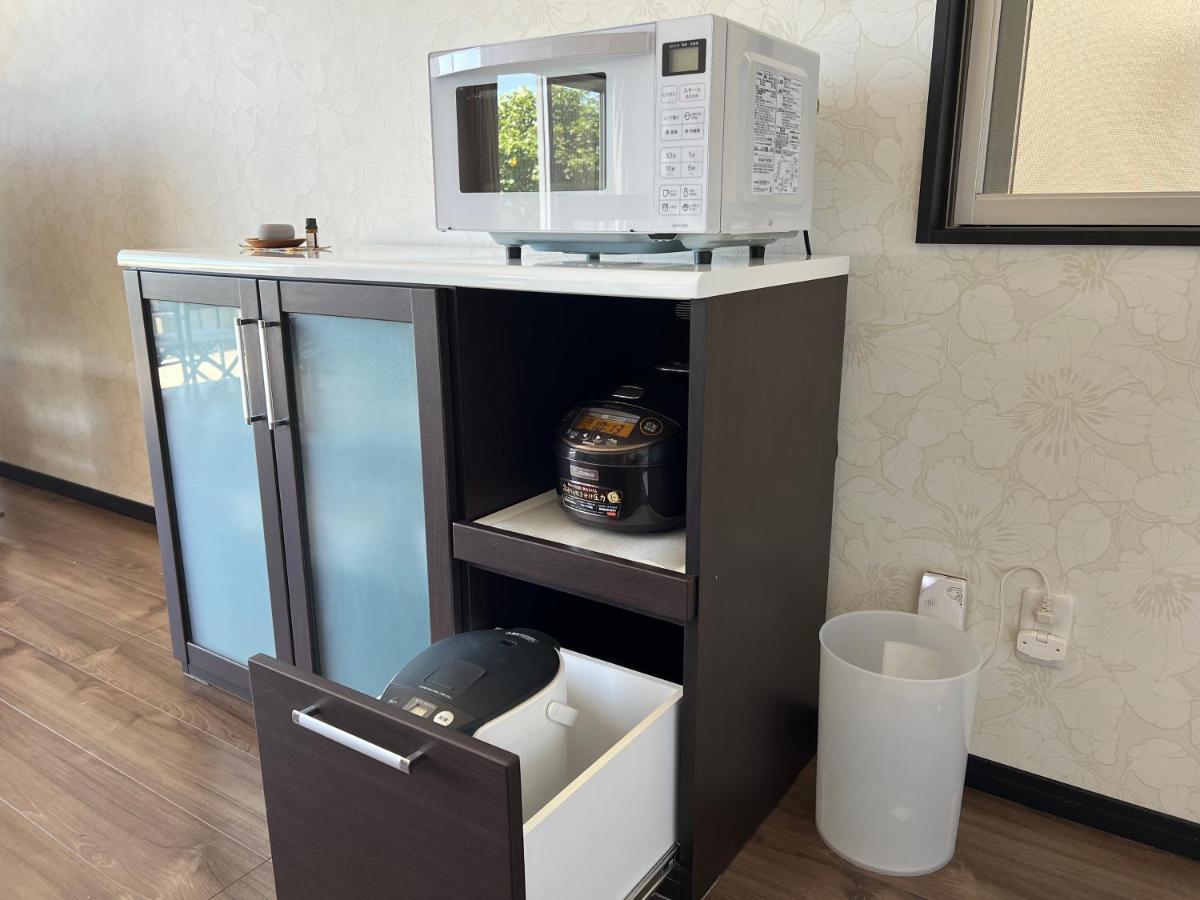 Appartamento Ocean Front Sumuide Nago Esterno foto