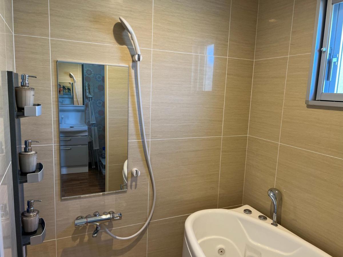 Appartamento Ocean Front Sumuide Nago Esterno foto