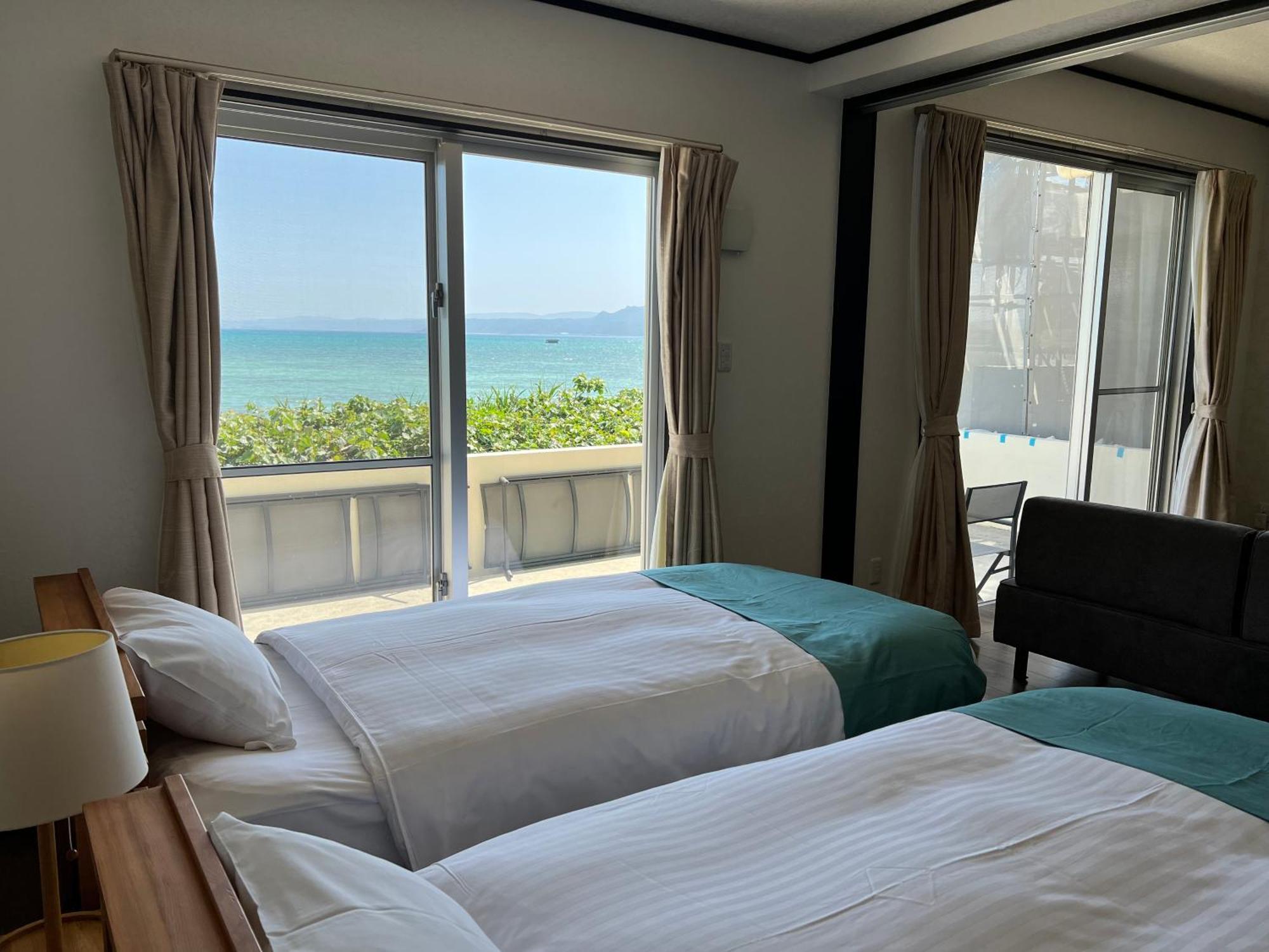 Appartamento Ocean Front Sumuide Nago Esterno foto