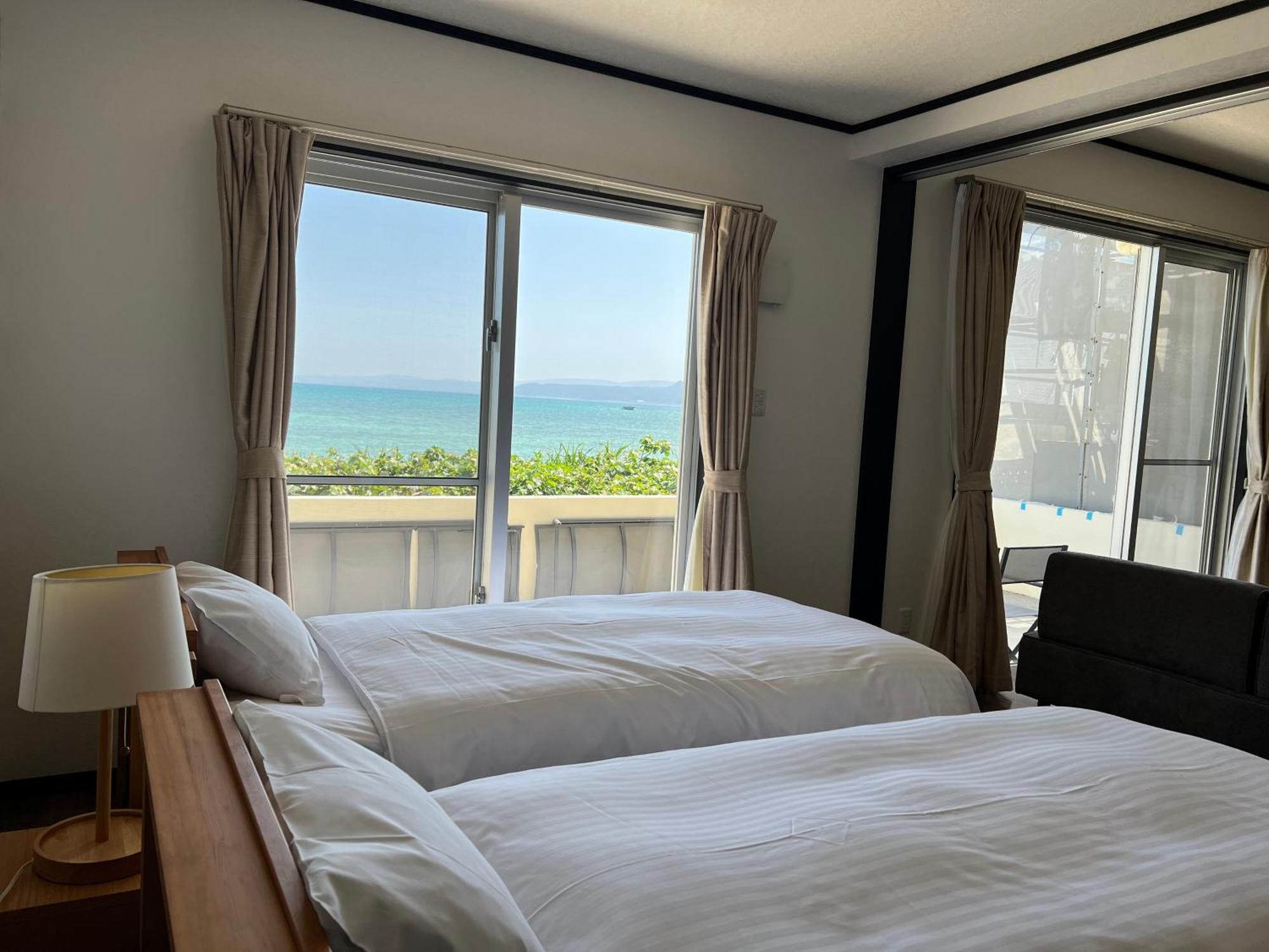 Appartamento Ocean Front Sumuide Nago Esterno foto