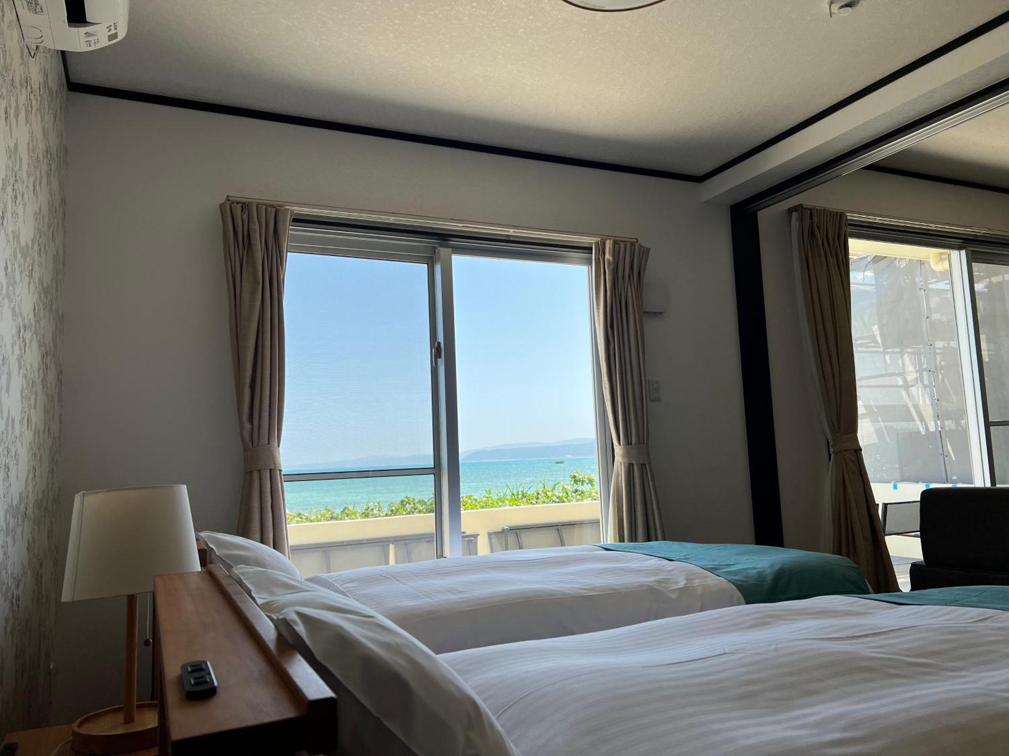 Appartamento Ocean Front Sumuide Nago Esterno foto